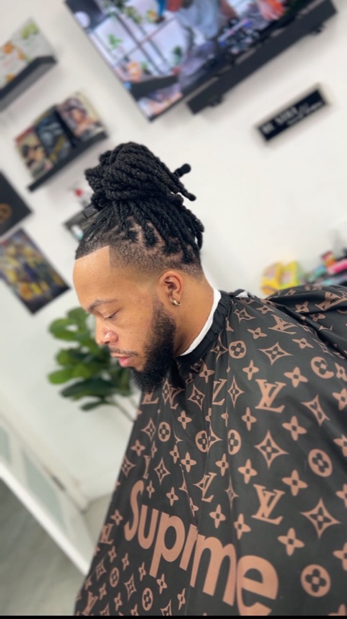 Locs styled in the chair